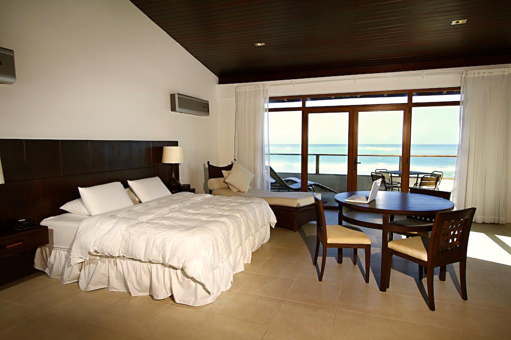 Iguana Crossing Boutique Hotel ปวยร์โต วิลยามิล ห้อง รูปภาพ