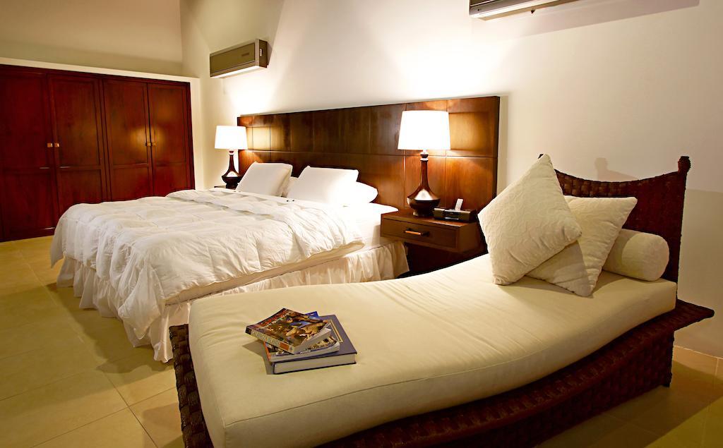 Iguana Crossing Boutique Hotel ปวยร์โต วิลยามิล ห้อง รูปภาพ