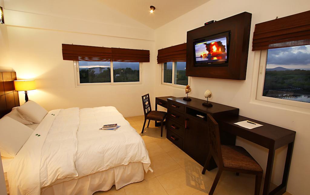 Iguana Crossing Boutique Hotel ปวยร์โต วิลยามิล ห้อง รูปภาพ
